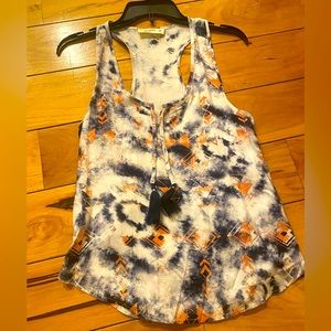 Fun and colorful tank top with tassels in the front. Only worn a couple times!
